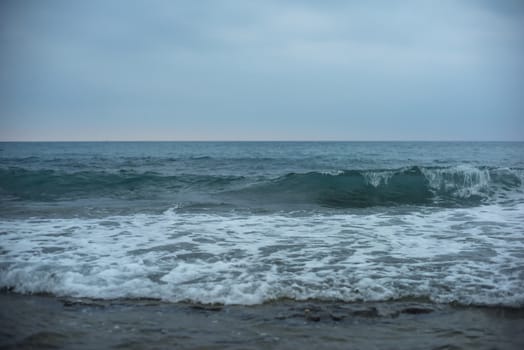 Blue sea with waves and sky