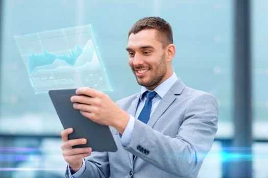 business, development, technology and people concept - smiling businessman working with tablet pc computer and virtual growth chart on city street