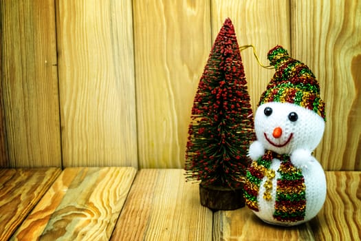 Christmas card with fir and decor on wood floor, christmas object