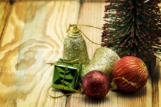 Christmas card with fir and decor on wood floor, christmas object