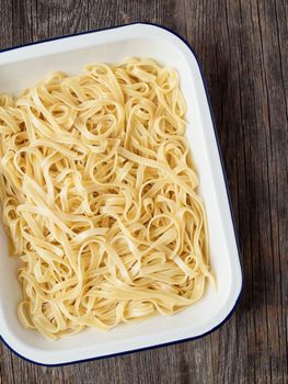 close up of rustic cooked italian fettuccine pasta