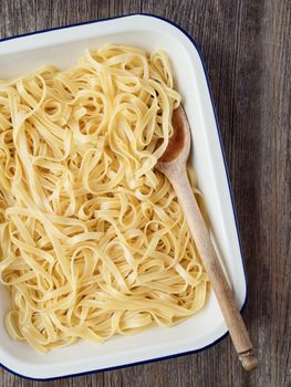 close up of rustic cooked italian fettuccine pasta