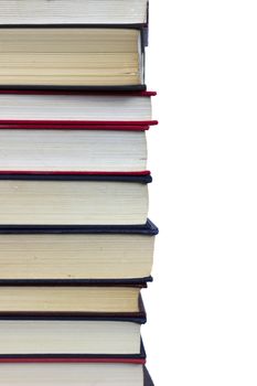 Stack of books on white background, partial view