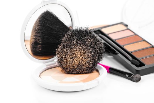 Makeup Powder and Brush on a white background