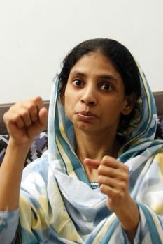 PAKISTAN, Karachi: A 23-year-old Indian woman, who inadvertently crossed the border into Pakistan when she was 11 years old, prepares to return home on October 25, 2015. Geeta, who is deaf and mute, lost her family and has lived in a home for abandoned children run by the Edhi foundation in Karachi.  Her family have been traced in India and she will be reunited with them after a DNA test has been done.
