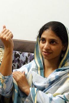 PAKISTAN, Karachi: A 23-year-old Indian woman, who inadvertently crossed the border into Pakistan when she was 11 years old, prepares to return home on October 25, 2015. Geeta, who is deaf and mute, lost her family and has lived in a home for abandoned children run by the Edhi foundation in Karachi.  Her family have been traced in India and she will be reunited with them after a DNA test has been done.