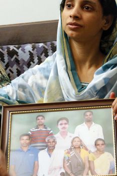 PAKISTAN, Karachi: A 23-year-old Indian woman, who inadvertently crossed the border into Pakistan when she was 11 years old, prepares to return home on October 25, 2015. Geeta, who is deaf and mute, lost her family and has lived in a home for abandoned children run by the Edhi foundation in Karachi.  Her family have been traced in India and she will be reunited with them after a DNA test has been done.