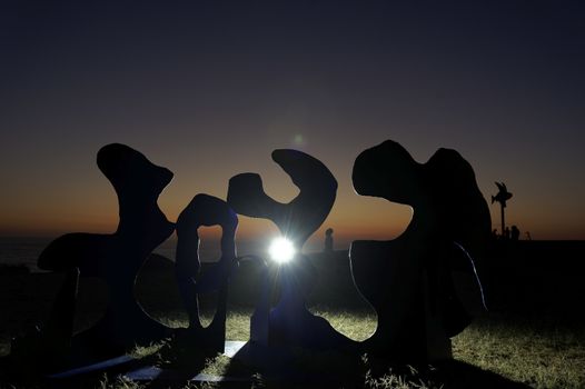 AUSTRALIA, Sydney: The Sculpture by the Sea exhibition in Sydney is photographed here on October 26, 2015 as the sun rises. The sculptures can be seen between Bondi and Tamarama and runs from October 22 to November 8, 2015. Artist: Paul Selwood - Billabong