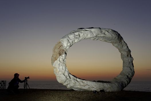 AUSTRALIA, Sydney: The Sculpture by the Sea exhibition in Sydney is photographed here on October 26, 2015 as the sun rises. The sculptures can be seen between Bondi and Tamarama and runs from October 22 to November 8, 2015. Artist: Peter Lundberg