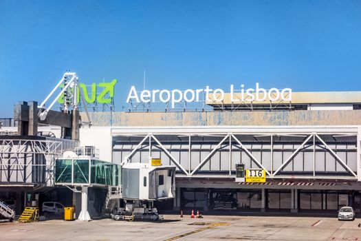 Lisbon, Portugal - May 30, 2013: At the airport of lisbon (Aeroporto Lisboa) after landing. Main gate with tower.