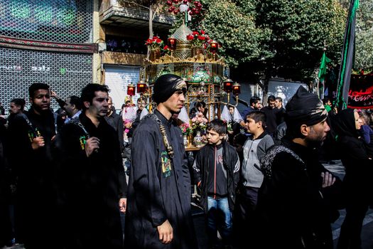 IRAN, Tehran: Iraqis living in Iran gathered to mourn in front of the Grand Bazaar in Tehran, Iran on October 23, 2015.Worshipers in these photos celebrate the Ashura, or tenth day of Muharram. Muharram is the first month in the Islamic calendar and the Ashura marks the day that the grandson of the Prophet Mohammad's grandson, Imam Hussein, was killed. 