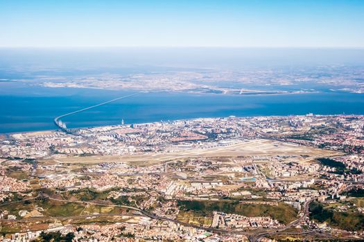 View over Lisbon - airport and river Tejo with bridge Ponte Vasco da Gama