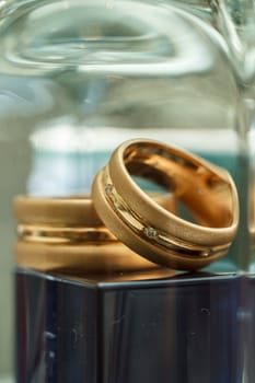 Beautiful wedding rings shot through glass macro