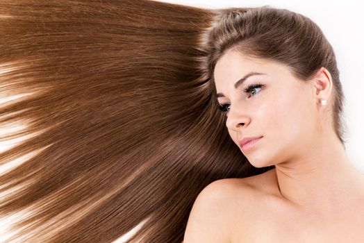 Portrait of Cute young girl with Beautiful healthy shiny hair.