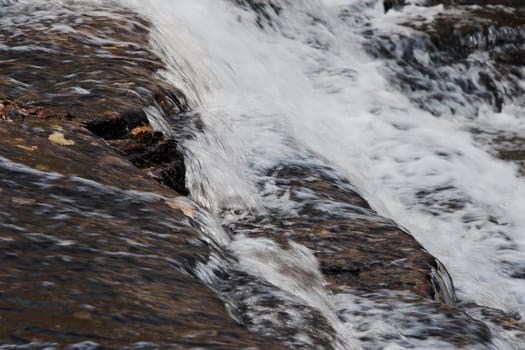 The waterfalls of the small but fast creek