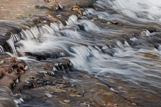 Beautiful micro waterfalls of a creek