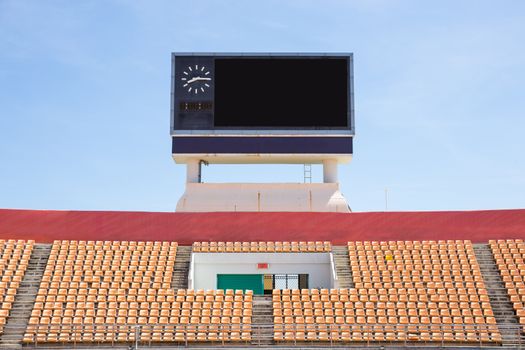 Scoreboard orange seat in stadium