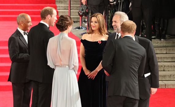 UNITED KINGDOM, London: Prince William, Duke of Cambridge, Catherine, Duchess of Cambridge and Prince Harry speak to Barbara Broccoli and Sam Mendes at the world premiere of the latest Bond film, Spectre, at Royal Albert Hall in London on October 26, 2015.