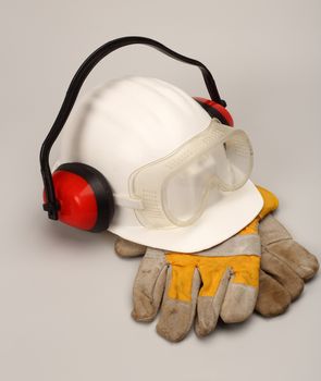 Safety gear kit close up over grey