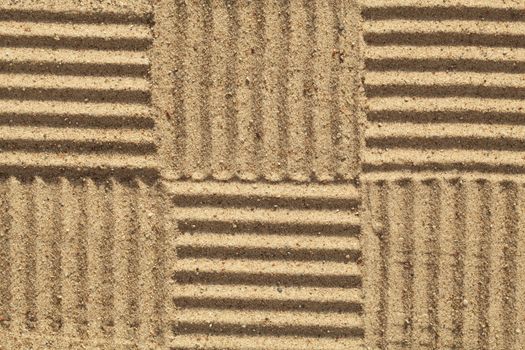pattern in checked with sand as background