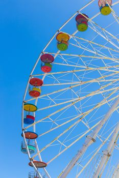 Giant ferris wheel in Amusement park with blue sky background