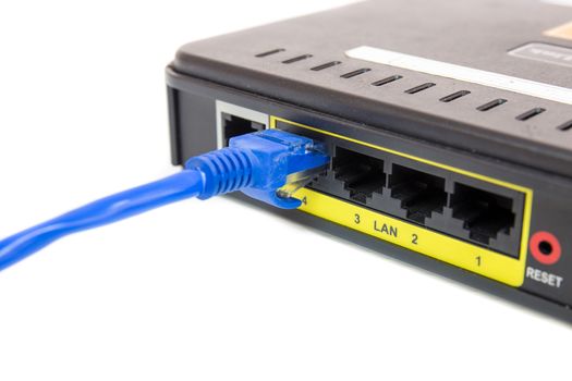 Close up LAN UTP RJ45 Cat5e connect to ADSL Router network switch