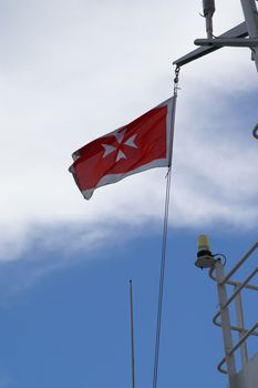 Malt flag on a cruise ship in mediterranean sea