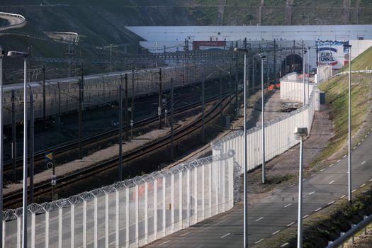 FRANCE, Calais: A general view of the French entrance of the Channel Tunnel is seen in Calais, northern France, on October 26, 2015. Since the beginning of the migrants crisis, railway company Eurotunnel has reinforced its security measures, including installing new fences to avoid migrants enter the site.