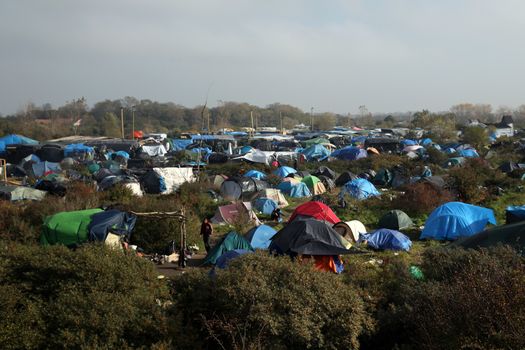 FRANCE, Calais: A general view of the New Jungle migrant camp in Calais, northern France, where around 6.000 migrants live in the hope of crossing the Channel to Britain, on October 26, 2015.