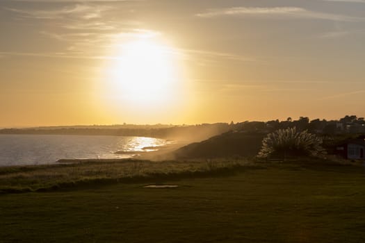 Sunset over land and sea