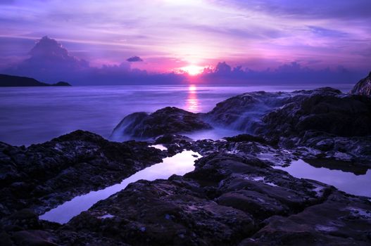 End of the Patong beach was cliff, sunset here was amazing and less people, is a good point for shooting sunset. Patong beach was the most famous beach in the Phuket, Thailand. This is the famous place every tourist must come, here have many sea sport, like para-sailing, jet ski. Here also was a good sunset view point.