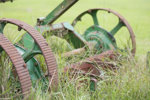 old farming lawn mower