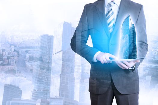 Businessman touching tablet with 3d city model on cityscape background