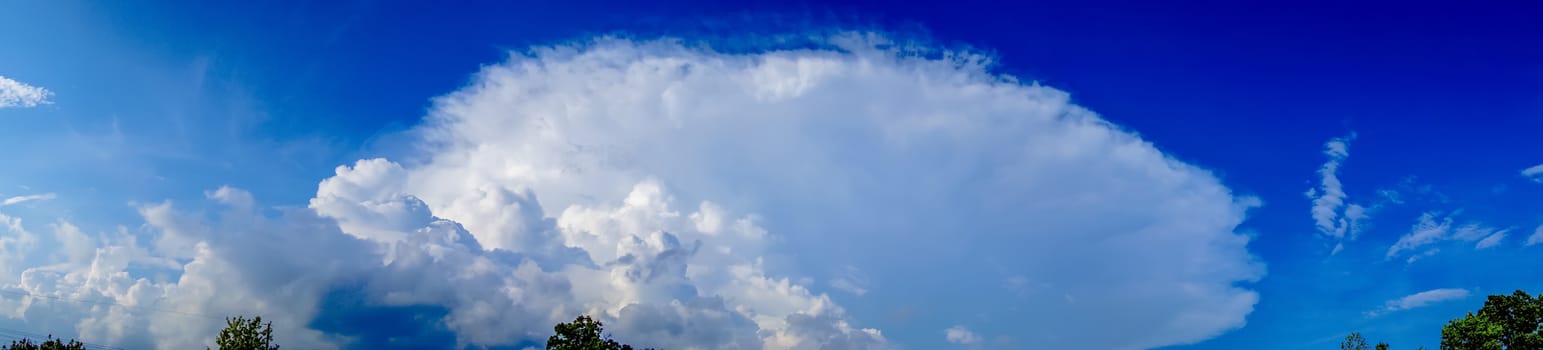 panorama of a cumulous cloud on blue sky