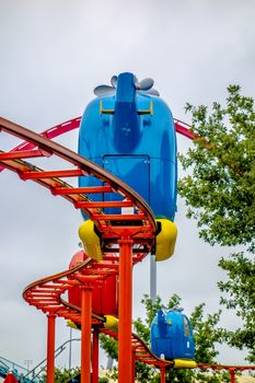 kiddie helicopter amusement ride at the park