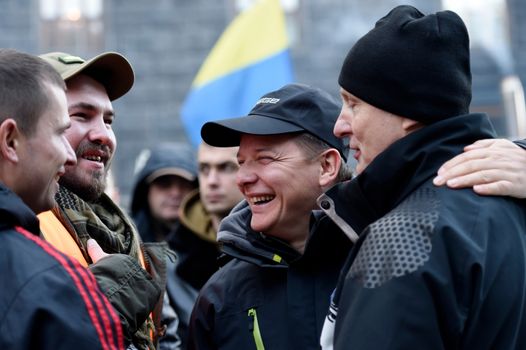 UKRAINE, Kiev: Radical Party leader Oleg Lyashko laughs with protesters outside the Cabinet of Ministers in Kiev, Ukraine on October 27, 2015, continuing a weeklong encampment as part of the Tariff Maidan protests. The movement calls on the government to establish fair utility tariffs for Ukraine, considered too high by protesters; along with the resignation of the president, prime minister, and cabinet of ministers.