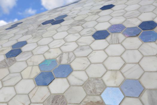 BONDI, AUSTRALIA - OCTOBER 25, 2015;  Annual Sculpture by the Sea free public event.  Exhibit titled Space Time Continuum V4 by Clayton Thompson made of a combination of steel, polystyrene, tile