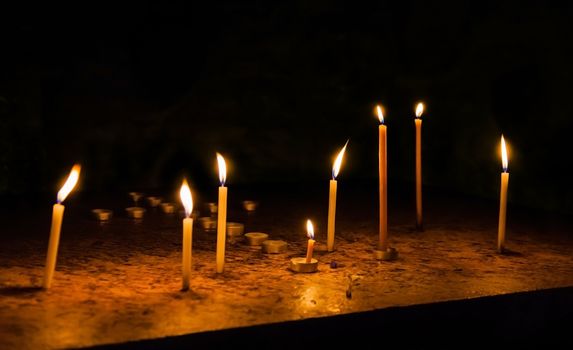 the dying candles in the church of the Holy Sepulchre 