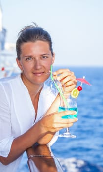 cute girl with a cold cocktail, enjoy the rest of the cruise summer