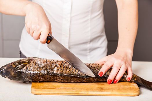 chef kitchen knife cut the fish into slices