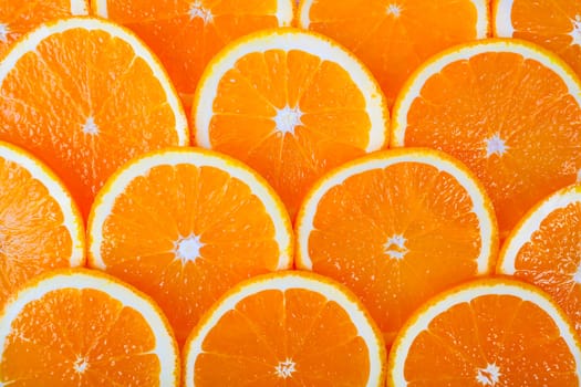 background of fresh juicy orange slices closeup