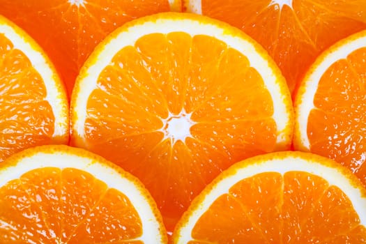 background of fresh succulent orange slices closeup