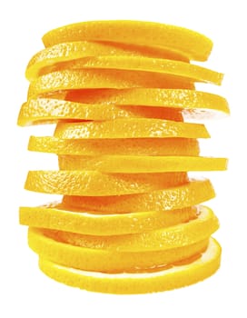 orange slices stacked on each other on a white isolated background