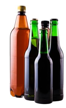 Beer in bottles of different varieties isolated on white background