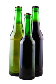 three bottles of beer isolated on a white background