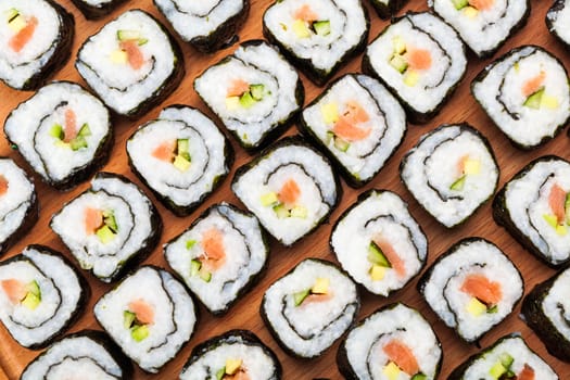 fresh cooked rolls close-up on a wooden board