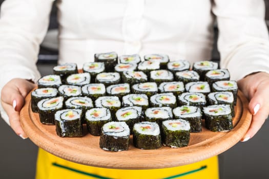 fresh cooked rolls close-up on a wooden board