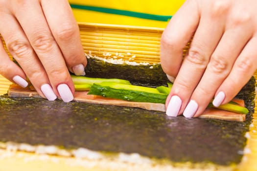 fresh sushi roll closeup on a wooden board