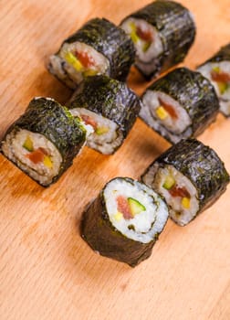 fresh cooked rolls close-up on a wooden board