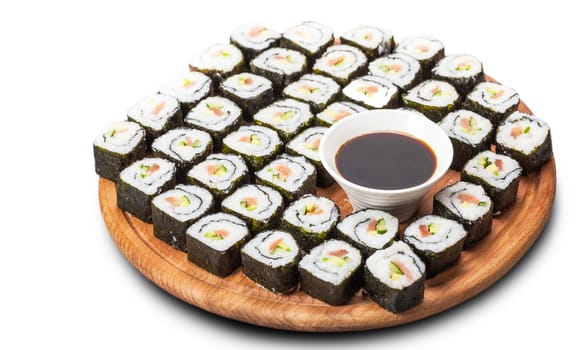 fresh sushi roll closeup on a wooden board